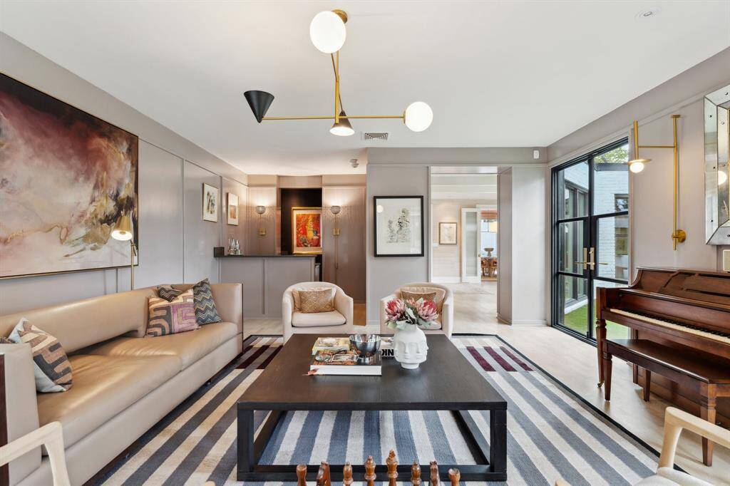 Another view of the formal living room looking back towards the custom made wet bar area.  Reeded glass doors (not shown) have recenlty been added to open/close off this space.