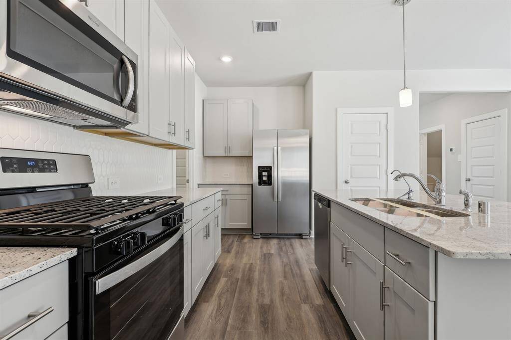 Photo is not of the actual home but is an inspirational photo of builder’s model home and may depict options, furnishings, and/or decorator features that are not included.