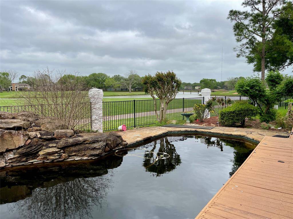 View along 160' fence towards bayou and Golf Course