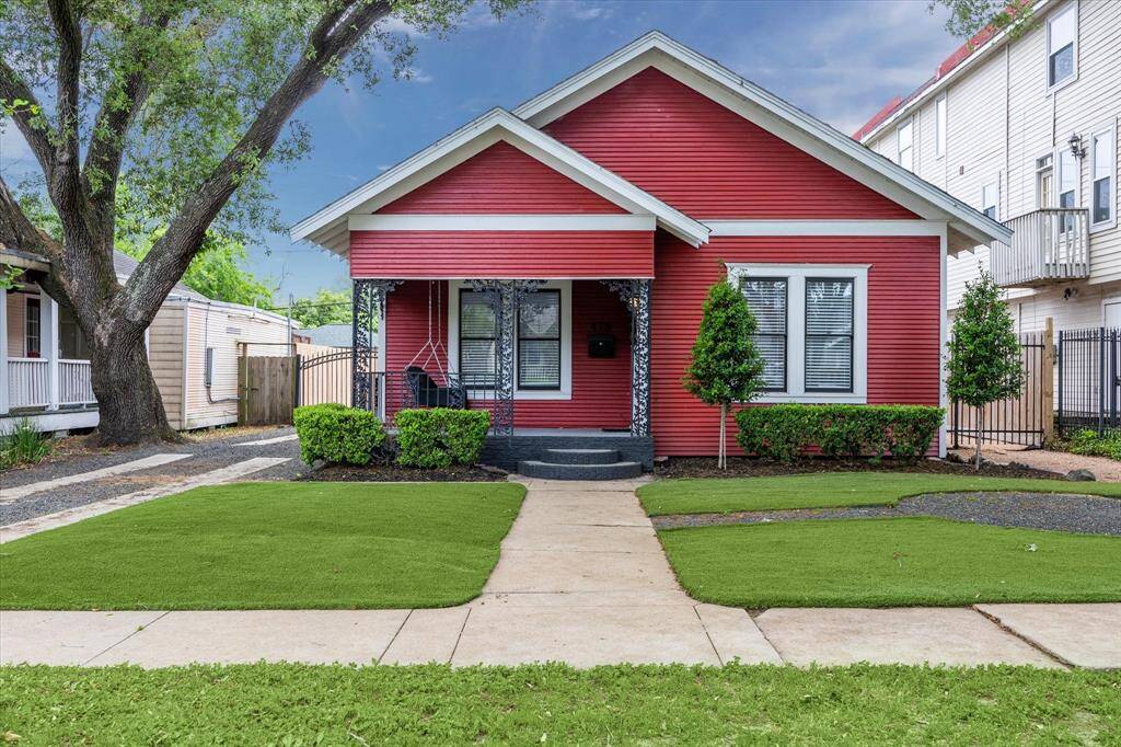 The little red bungalow on Harvard in the Heights. It's picture perfect!