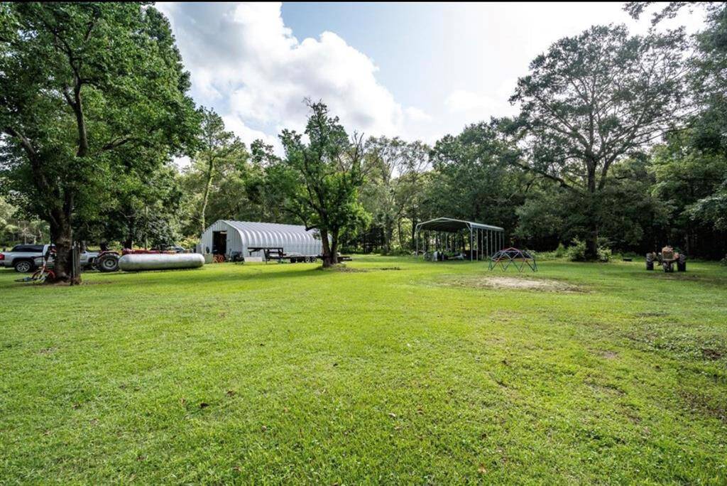 7 acres of land with warehouse and RV/ Boat port.