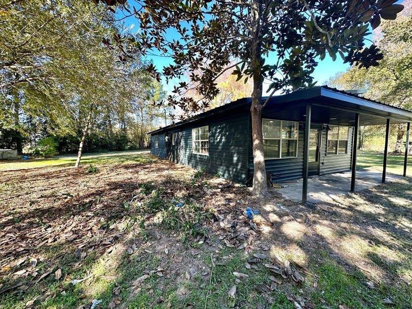 Another view of the back and side of home.