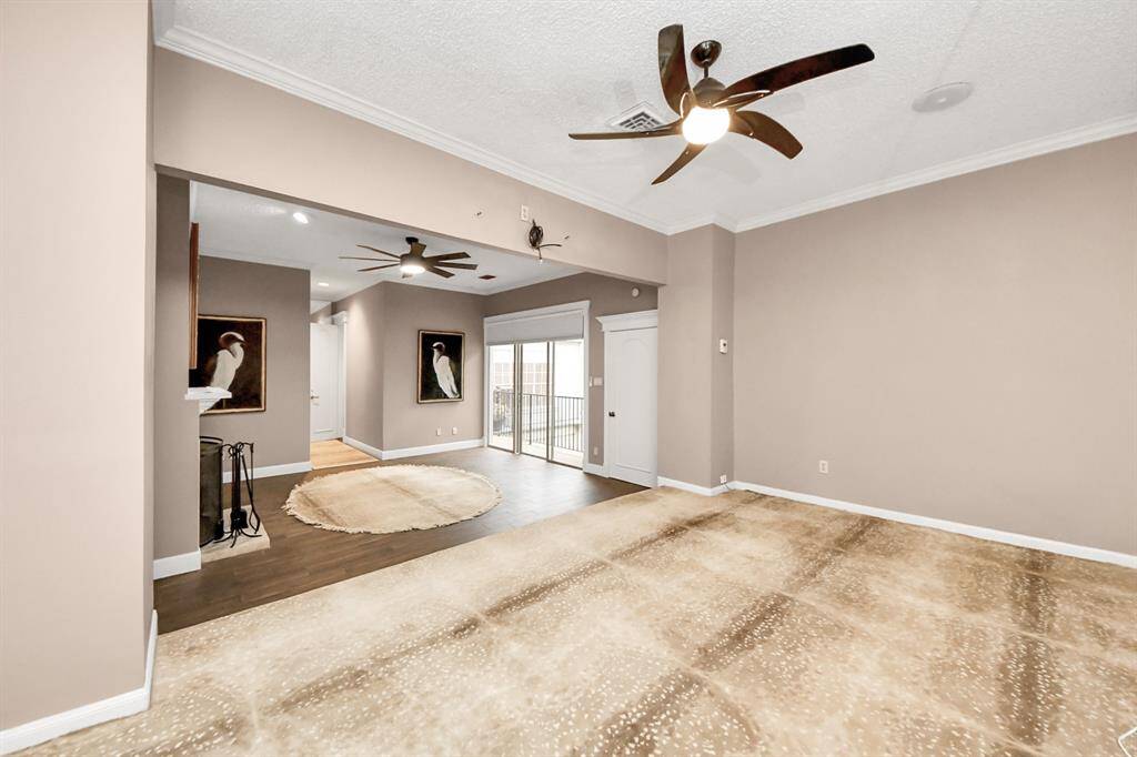 The primary bedroom has a step up to the sleeping area while you enjoy the extra space of a living area with fireplace. All in your primary suite!