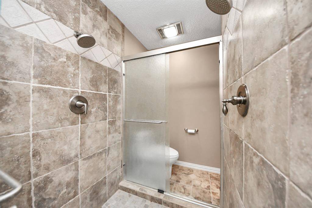 Room for plenty in the giant shower (this is not the primary bath, but for the secondary bedrooms!)