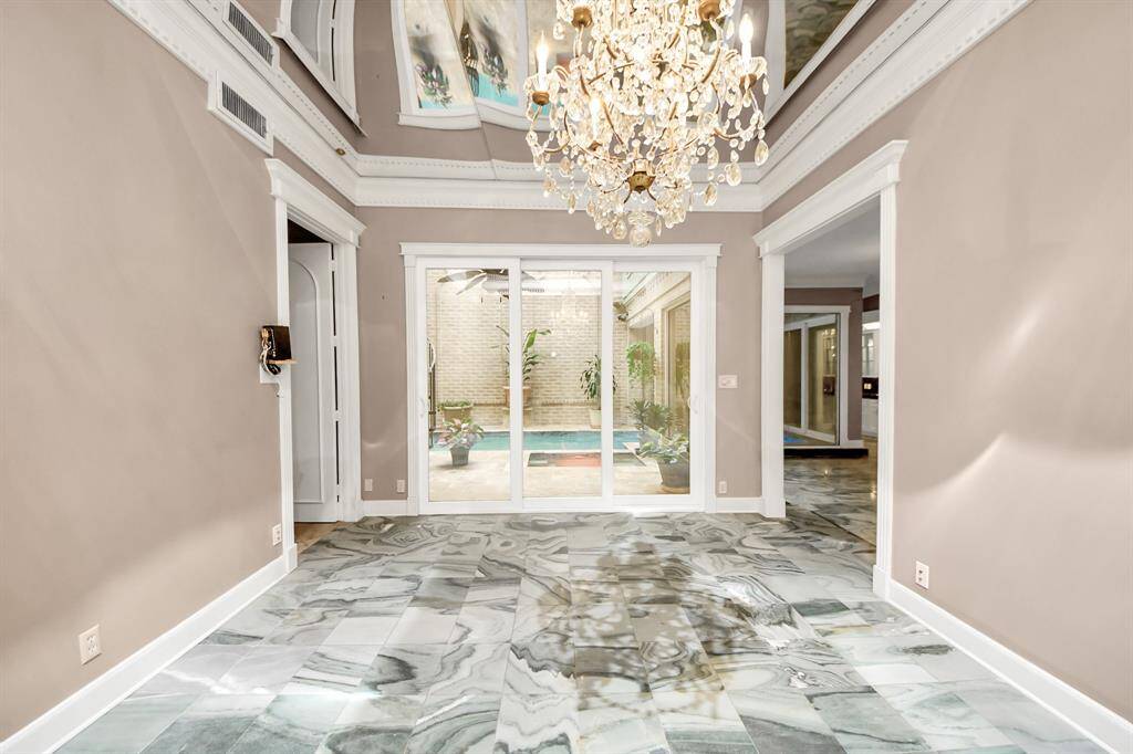 Dining room also has outdoor views to your pool