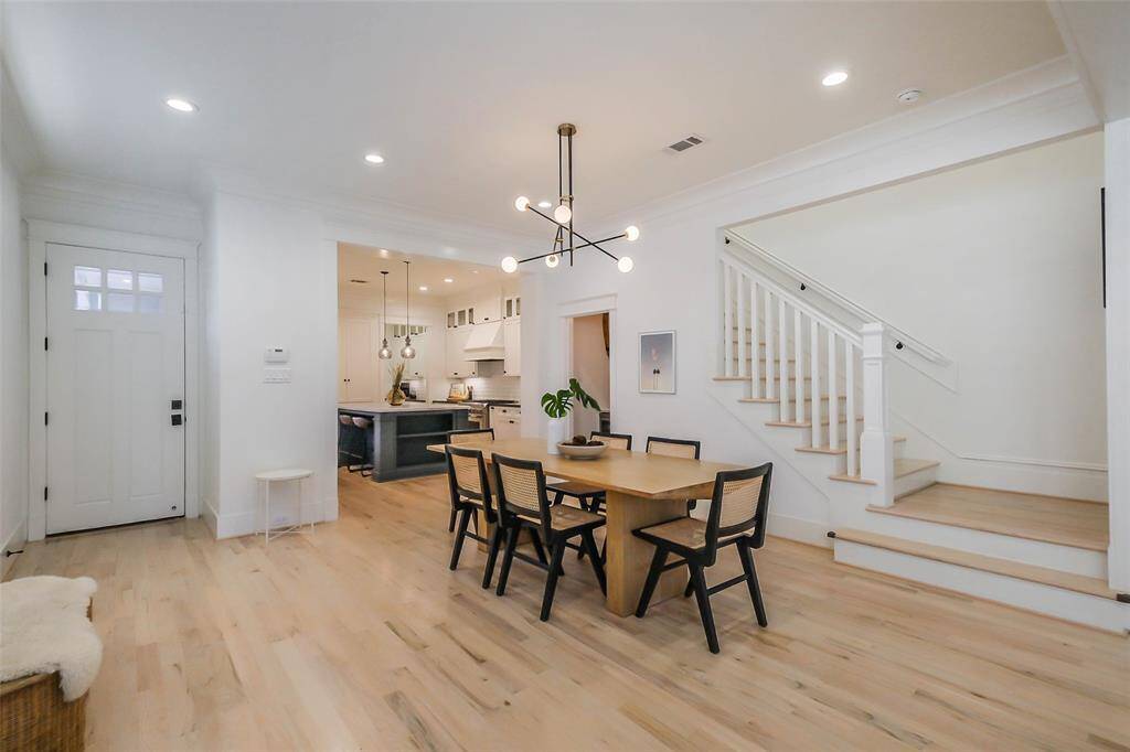 Fabulous new light fixture serves as the Centerpoint of this Formal Dining Room