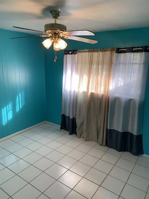 #A unit tiled floor bedroom 2