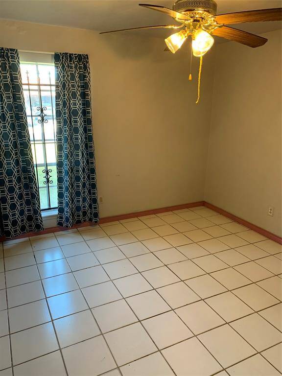 #A unit tiled floor bedroom 1
