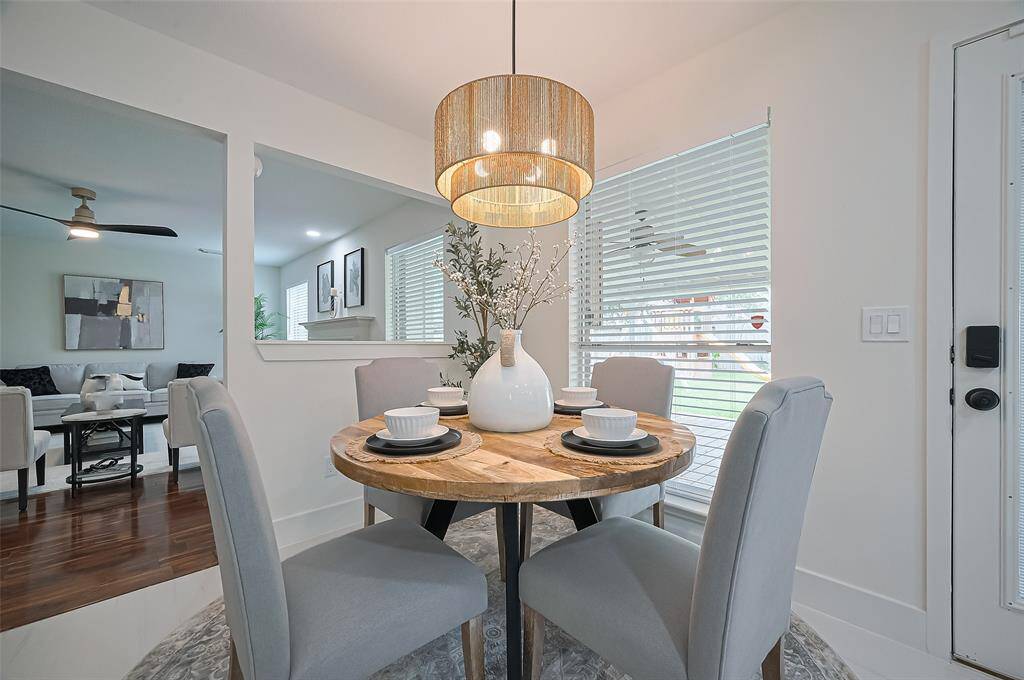 Breakfast room opening to living area ~ makes gathering easy!