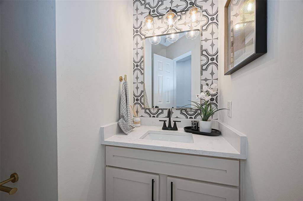 Powder bath remodeled with stylish custom finishes