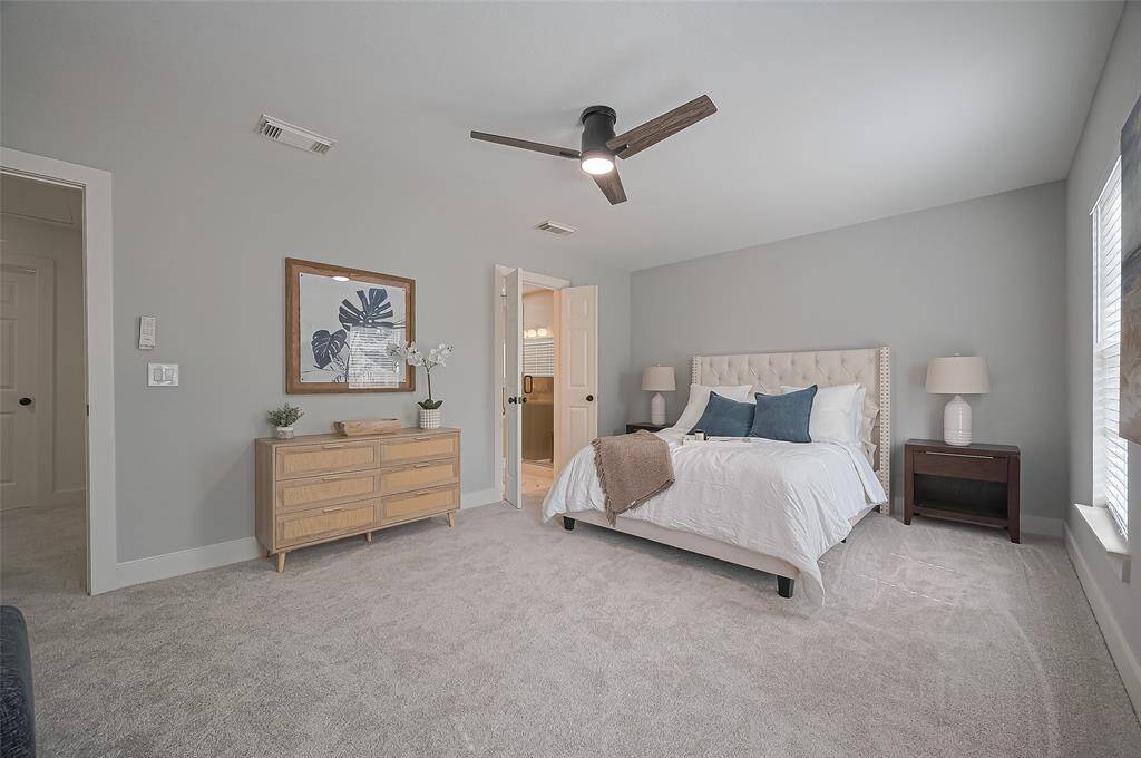 Primary bedroom offers a beautiful, large space to relax and unwind!