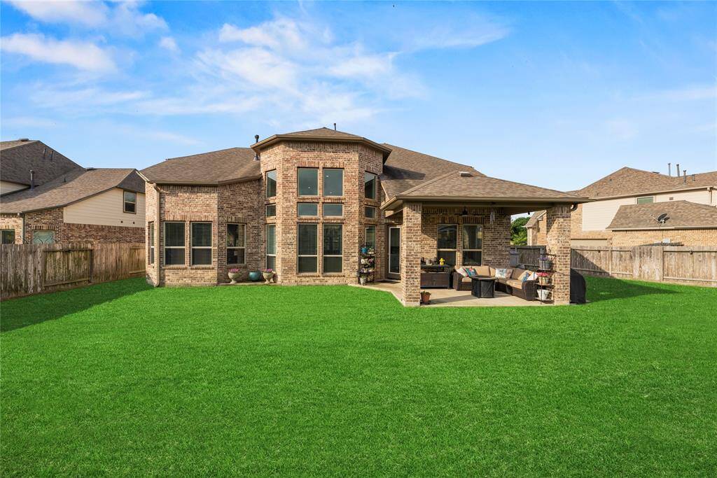 Check out the back of this gorgeous home! Great privacy.