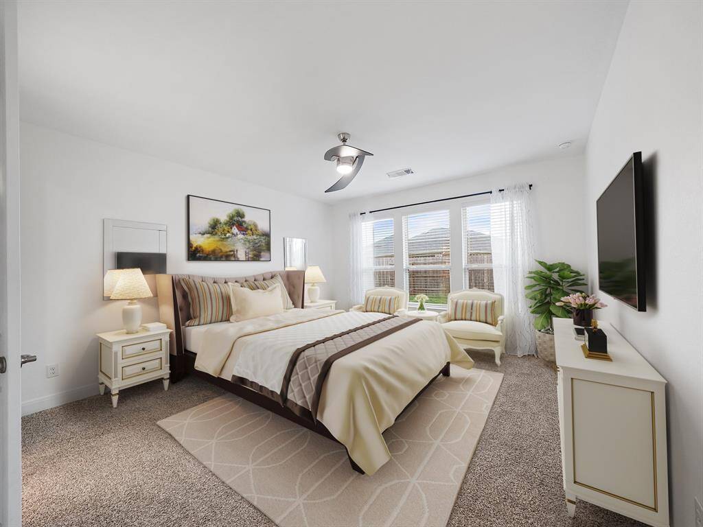 **Virtually Staged**Relax and unwind in your primary retreat with views of the backyard.