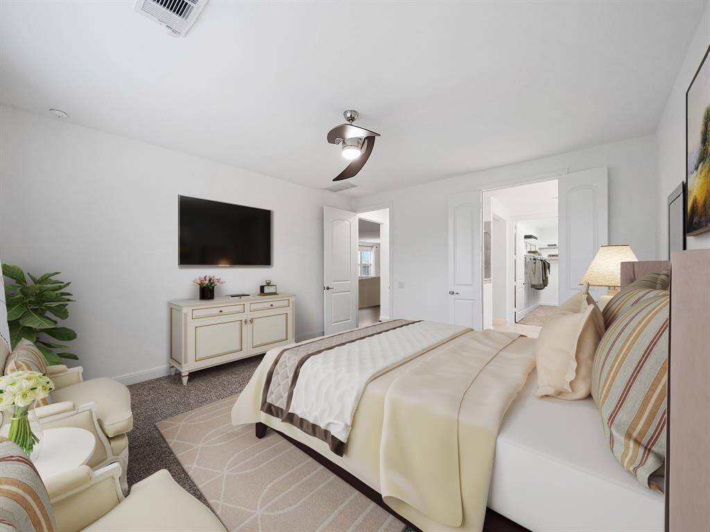 **Virtually Staged** Double door entry into the en suite bath.
