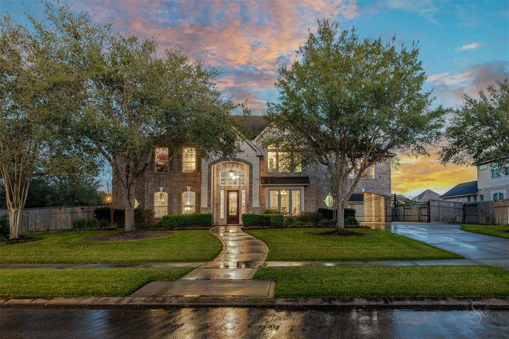 LUXURY Trendmaker home in Cross Creek Ranch featuring 5 bedrooms, 4 full & 2 half baths is perfectly designed for high-end living both indoors & out. Located on a huge 1/2 ACRE+ corner lot, this architectural masterpiece features a porte-cochere, wrought iron driveway security gate, 6 car garage & autocourt.