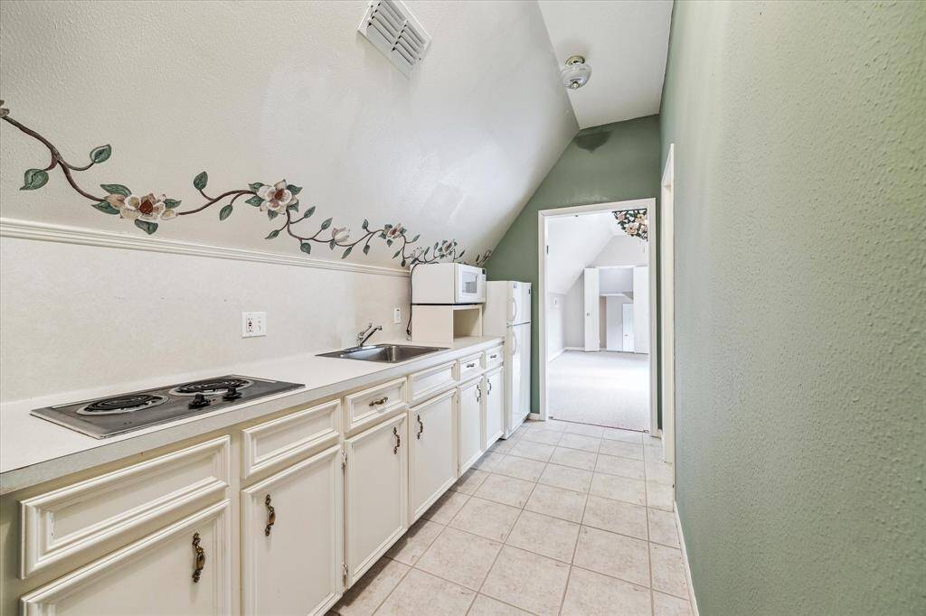 The kitchenette in the guest quarters that leads to the private bedroom and bathroom.