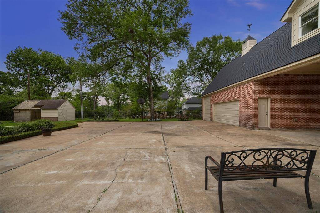 Plenty of space for parking, basketball, and the oversized garage is perfect for your boat or RV.