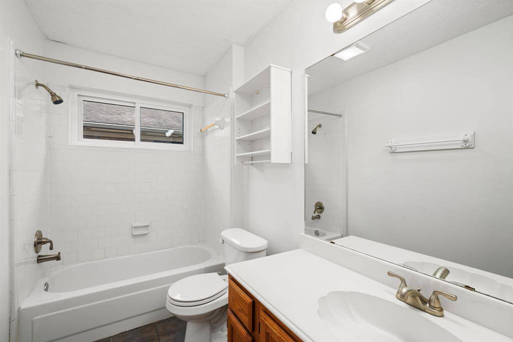 The secondary bathroom offers a tub/shower combo, and serves both secondary bedrooms as well as your guests.