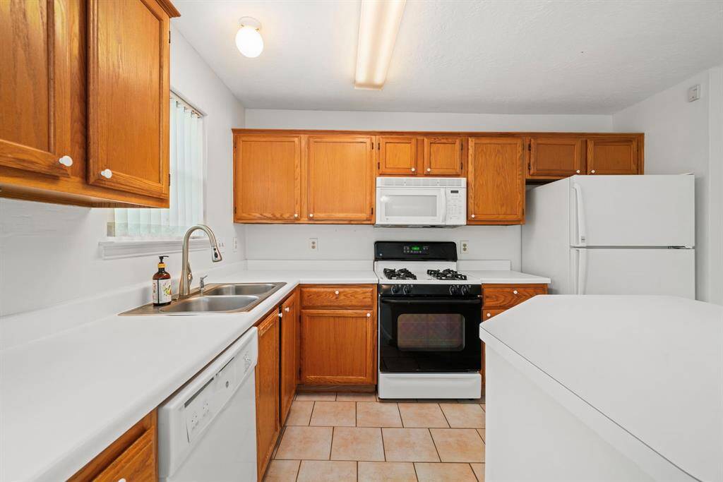 Plenty of countertop space, and the central island offers a great area for additional prep or serving.
