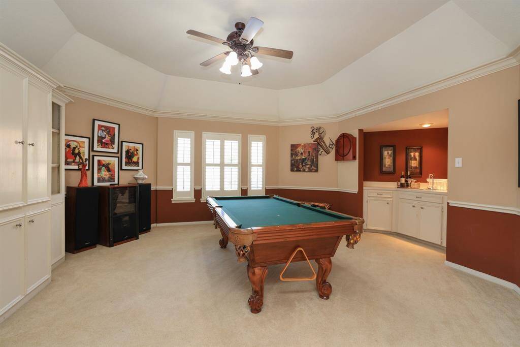 Large Game room with built-ins and wet bar!
