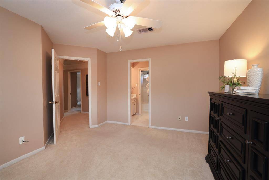 This bedroom has access to one of two bathrooms on the second floor.