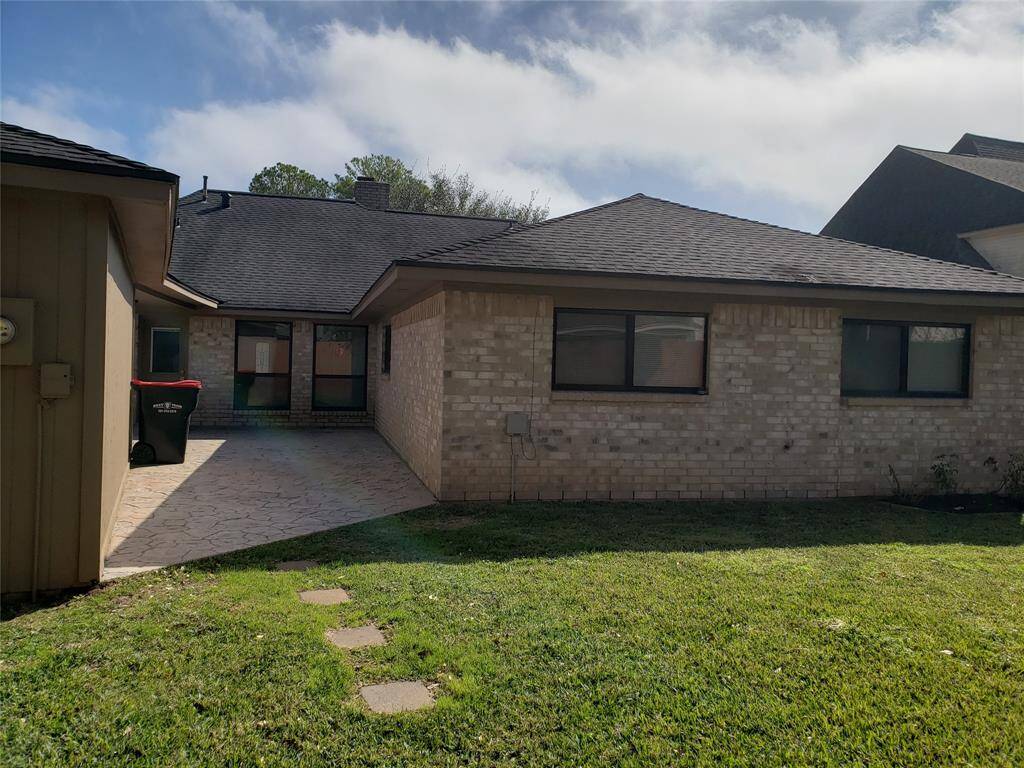 REAR VIEW OF THE HOUSE