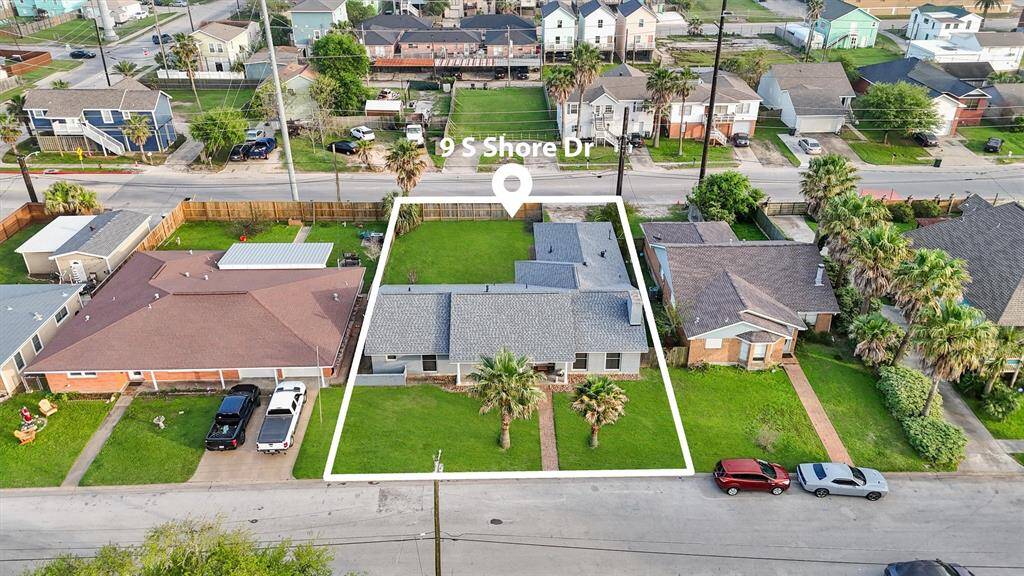 Outlined aerial image clearly showing the property boundaries of 9 S Shore Dr, emphasizing its generous lot size.