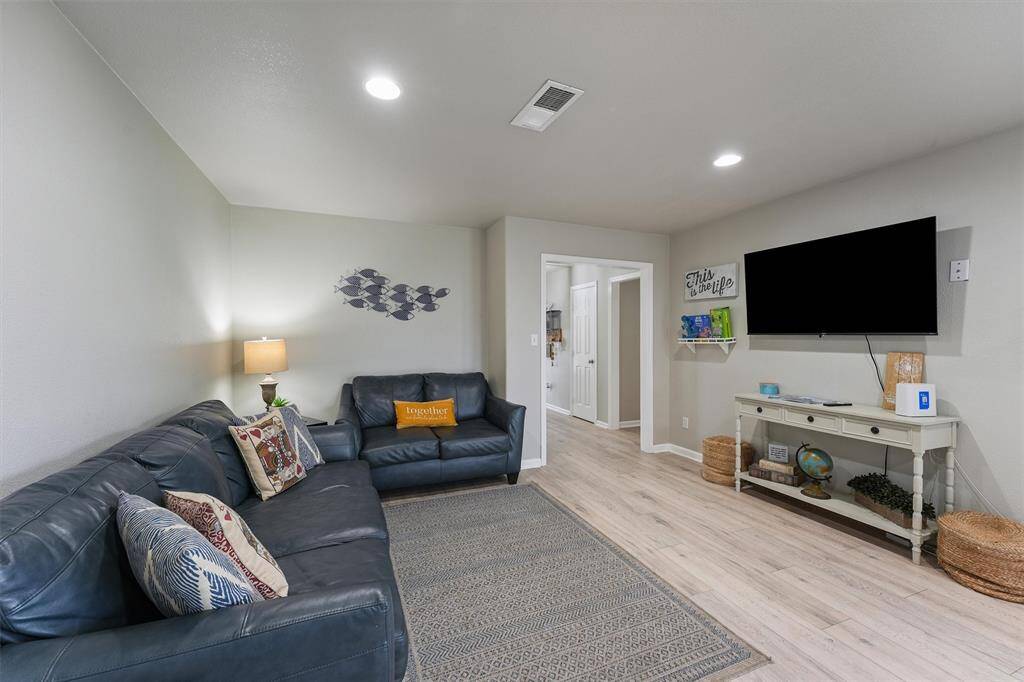 From the living room, enjoy seamless flow into the kitchen and entryway, making this layout ideal for everyday living and entertaining.
