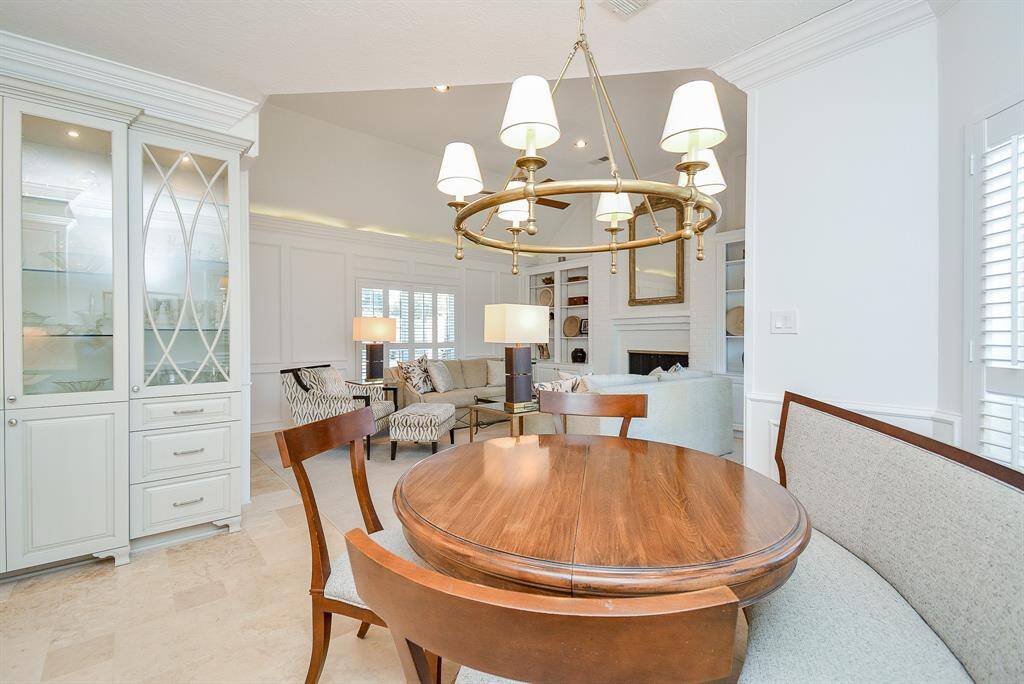 This Chef Inspired kitchen also features a High End Stainless Steel Refrigerator.