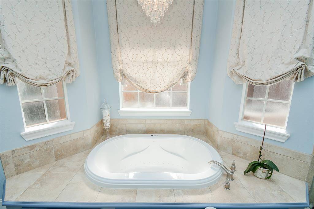 The Large Farmless Shower has Dual Showerheads and the large vanity offers Lots of Storage Space.