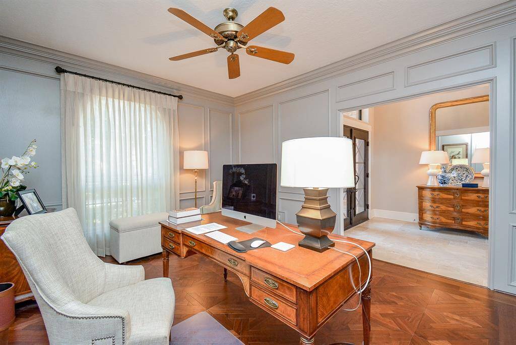 This Fabulous Office also features Built-In Bookshelves offering Classic Elegance. and Storage Space