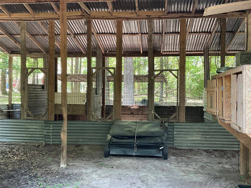 View of the stalls from inside the barn.