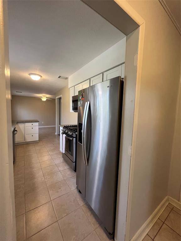 View of the kitchen from the laundry room.