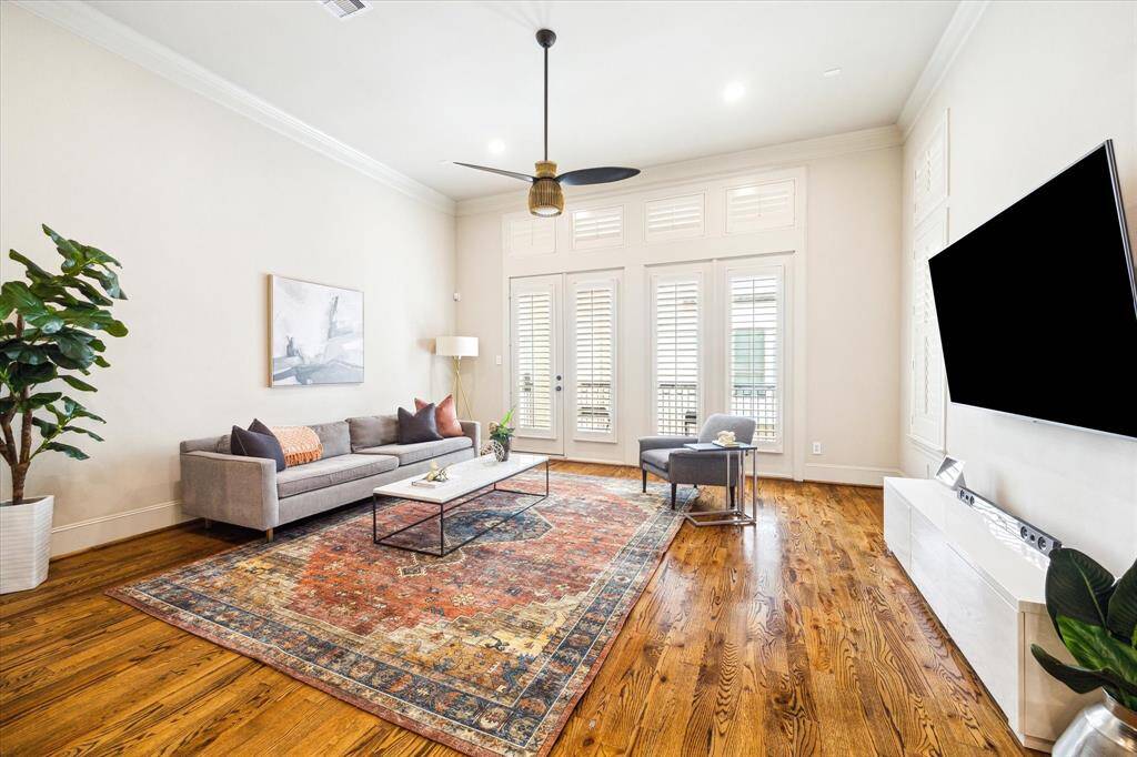 Large living space with soaring ceilings throughout the second story