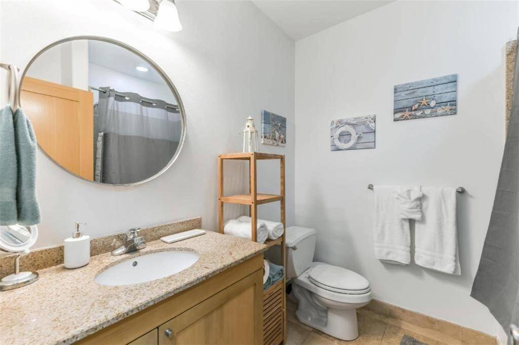 The Primary Bathroom offers lots of storage, granite countertops, and a jetted spacious tub.
