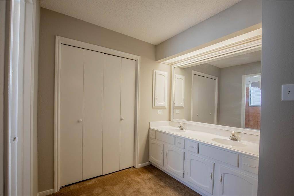 Dressing area with very large closet, with shelves for towels & make-up,ect,