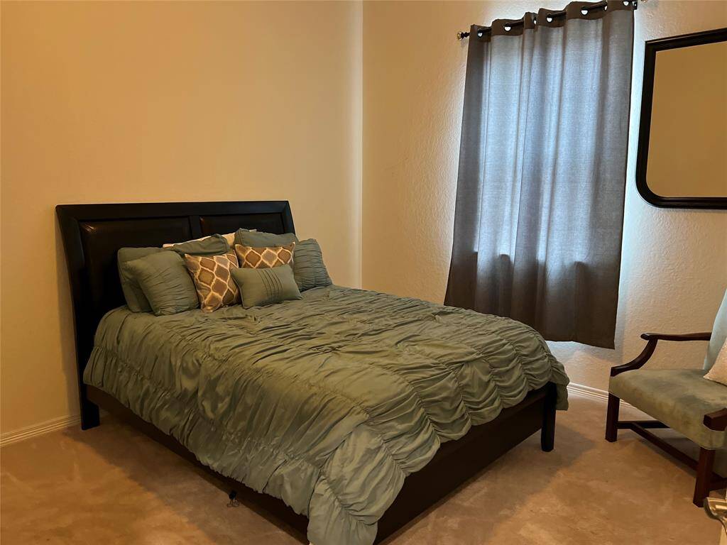 Bedroom located midway in the home.  Next to the Gameroom.
