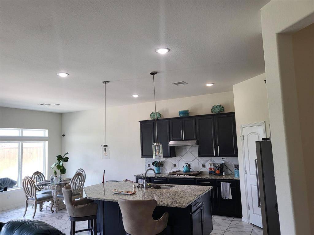 Looking from end of entry hall to the kitchen.