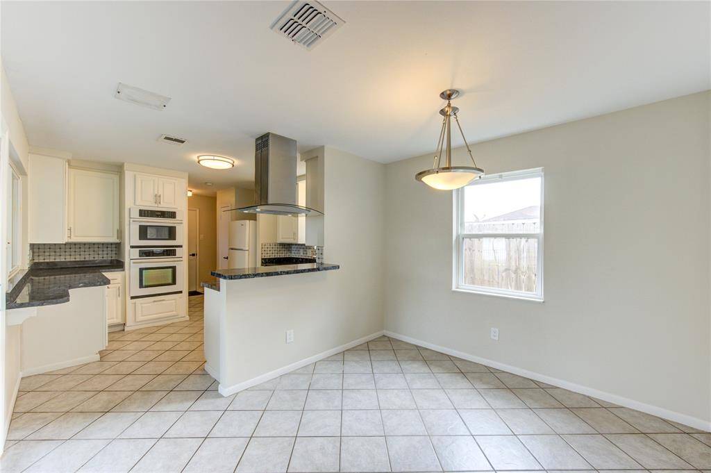 Breakfast room and kitchen.