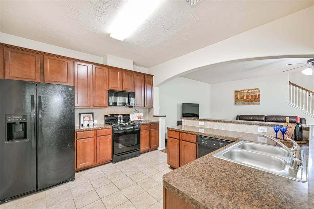 Spacious kitchen open to living and dining area