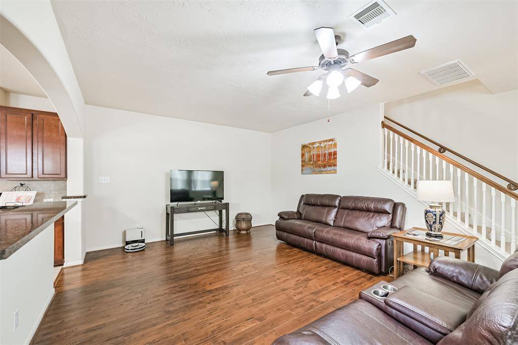 View of spacius living area that is open to kithen!!