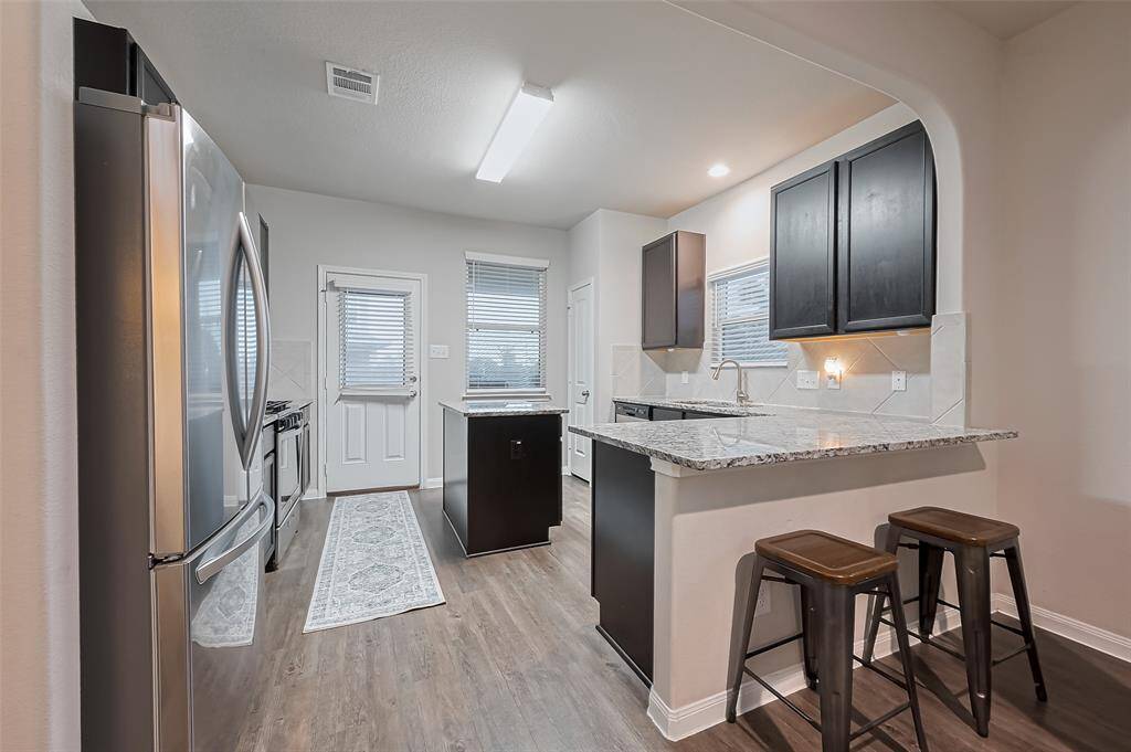 Breakfast bar and kitchen