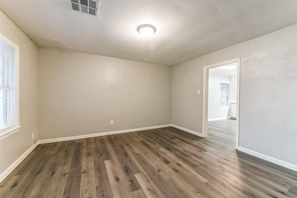 Formal dining room can be used for office or extra living space