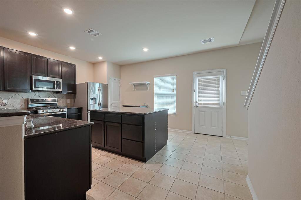 Stainless steel appliances.Refrigerator included.