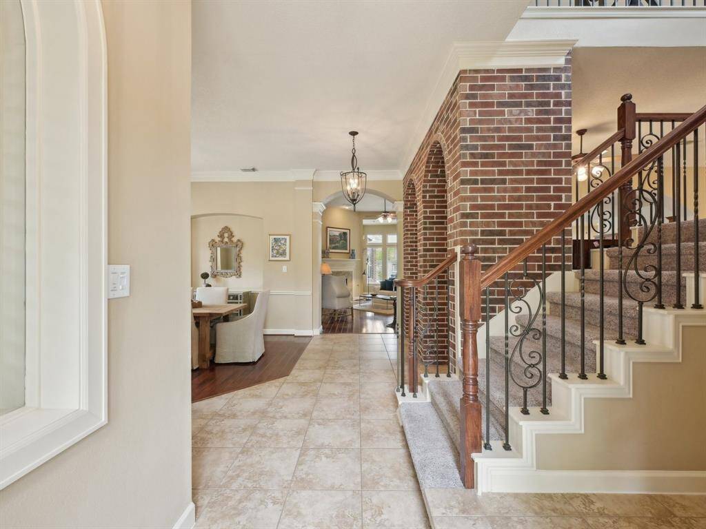 Beautiful wrought iron banisters adorn the staircase.