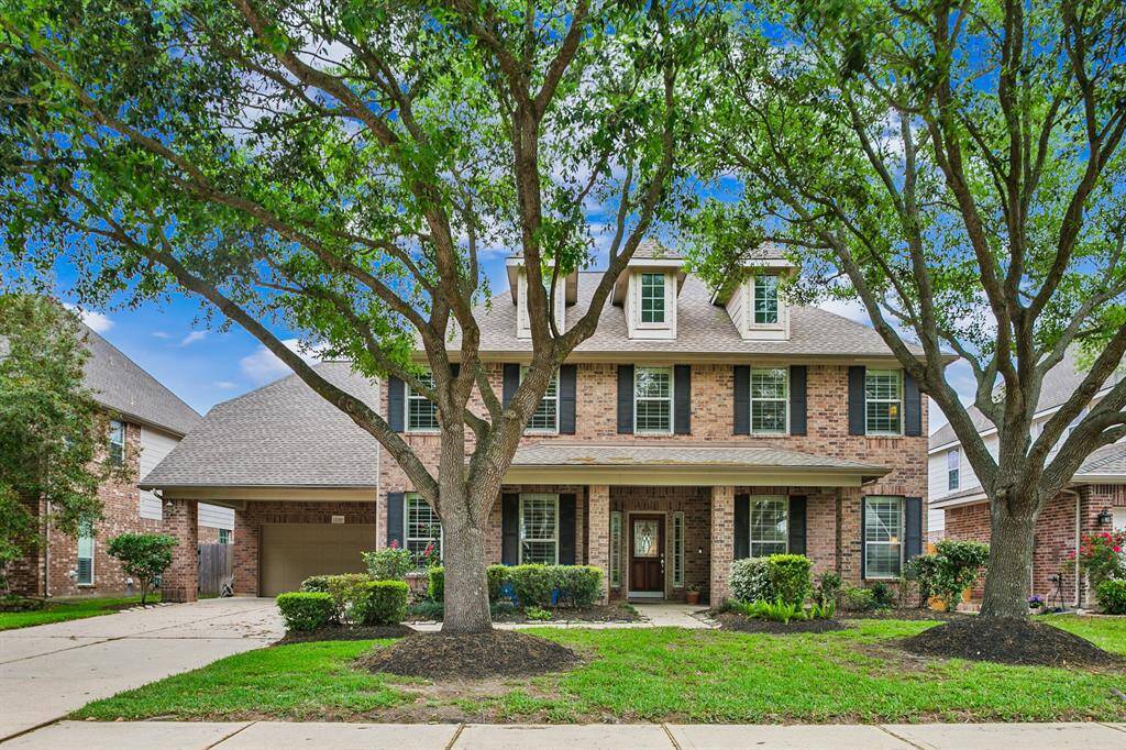 Charming waterfront home idyllically located on a quiet cul-de-sac lot in coveted master-planned community in Cypress Creek Lakes.