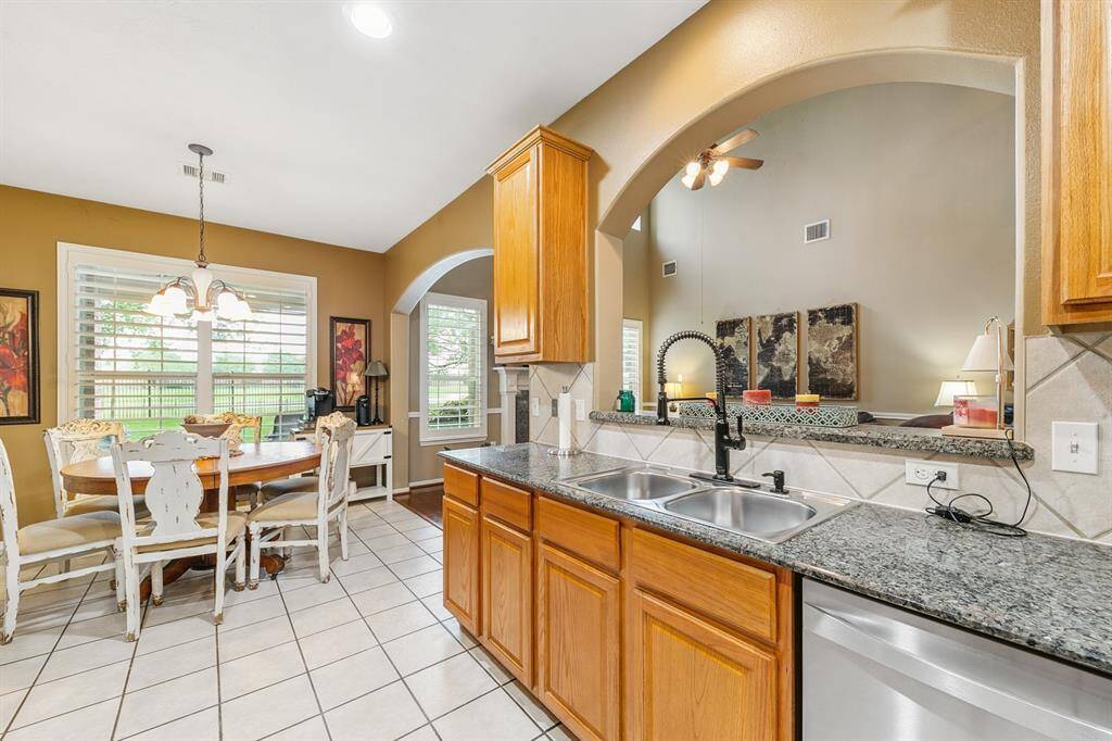 Open, airy and inviting, this home features sweeping spaces and a easy floor plan.