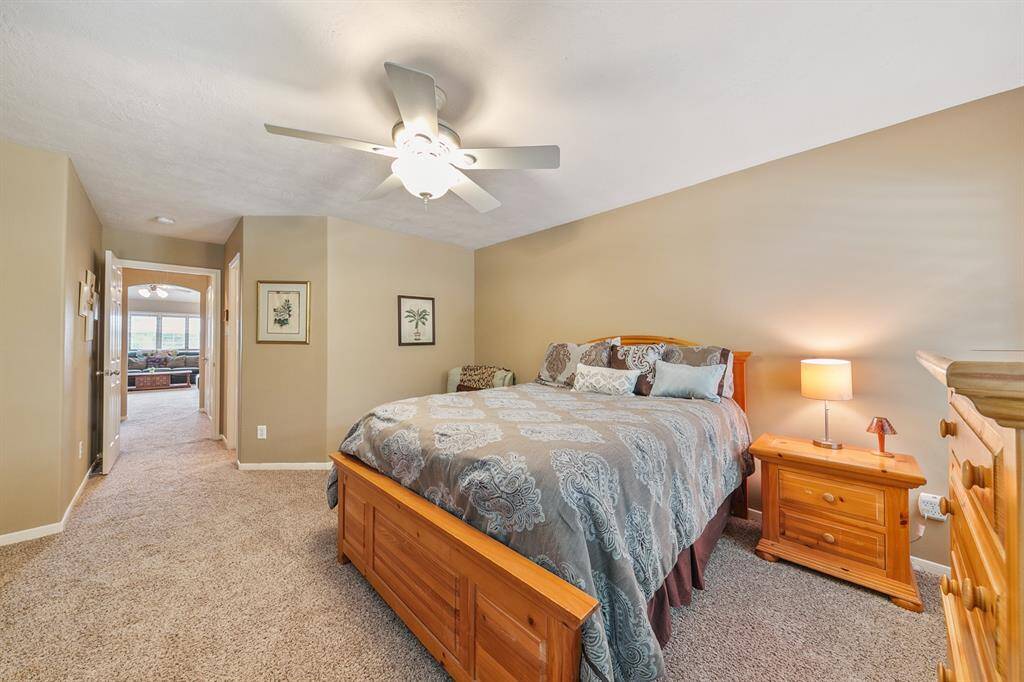 Guest bedroom off of the game room with a bath that serves both rooms.