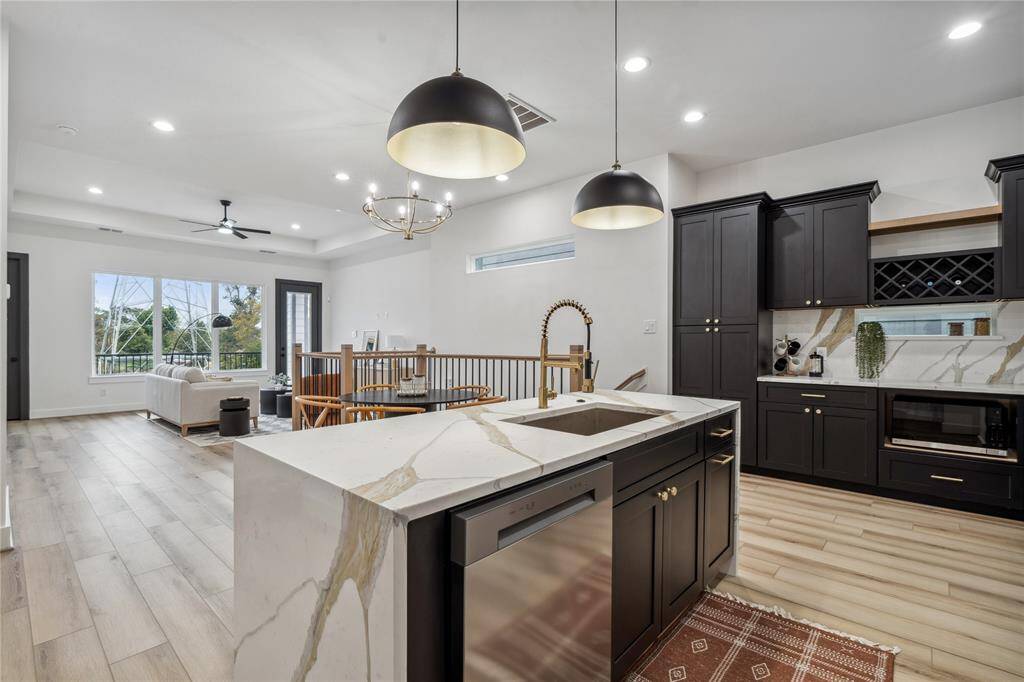 Finish Line unveils a luxurious home in Independence Heights proper with a transitional design filled with sophisticated details.