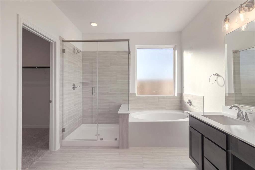 The elegant finishes, from the dazzling floors to the chic light fixtures, reflect a caref